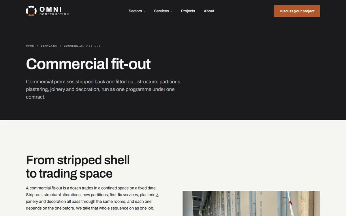A service page on the Omni Construction Group website, with a plain headline, a short description and a photograph of work in progress