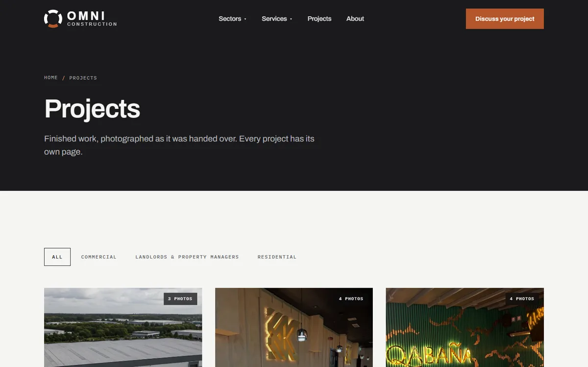 Omni Construction Group: The projects index, filtered by sector, with a photo count on every card.